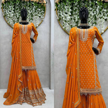 Load image into Gallery viewer, Faux Georgette Musturd Colour Heavy Embroidary And Sequence Worked Wedding Wear Sharara Suit Collection
