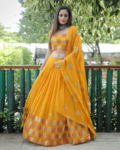 Load image into Gallery viewer, Slpendid Heavy Faux Georgette Designer Lehenga With Seq Work For Girls
