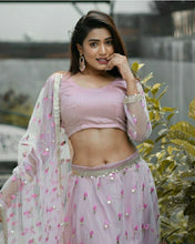 Load image into Gallery viewer, Flattering Baby Pink Color Net Sequence Work Lehenga Choli For Festive Wear
