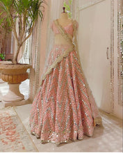 Load image into Gallery viewer, Classic Peach Color Soft Net Sequence Embroidered Lehenga Choli
