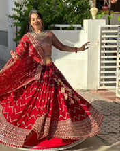 Load image into Gallery viewer, Lovely Red Color Faux Georgette Heavy Embroidered Semi Stitched Lehenga Choli
