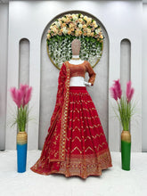 Load image into Gallery viewer, Lovely Red Color Faux Georgette Heavy Embroidered Semi Stitched Lehenga Choli
